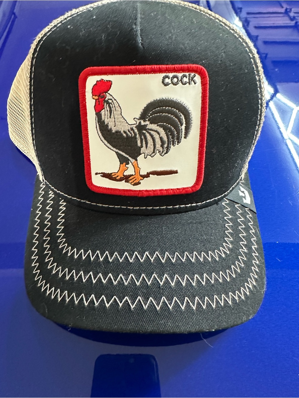 Goorin Bros Black and Red Rooster Patch Trucker Hat